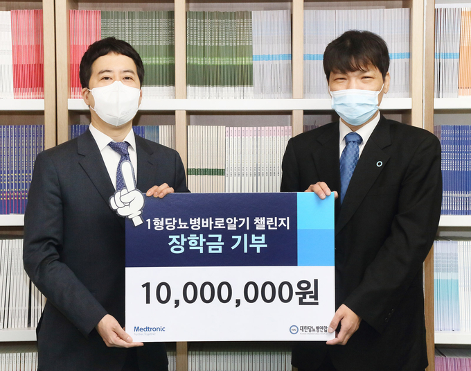 김광훈 대한당뇨병연합 대표이사(우)와 김동우 메드트로닉코리아 당뇨사업부상무(좌)